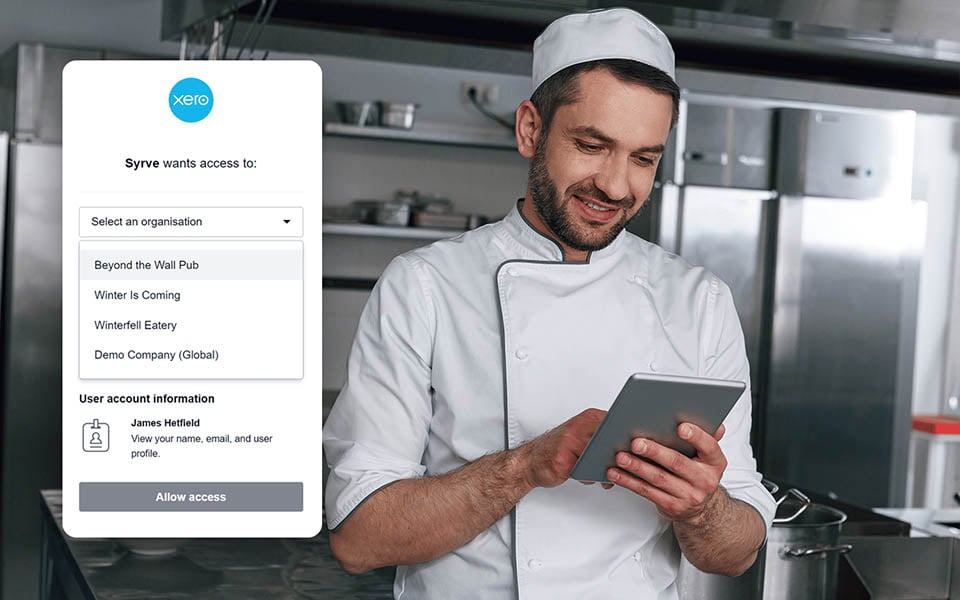 Chef reviewing restaurant accounting integration with Xero on a tablet
