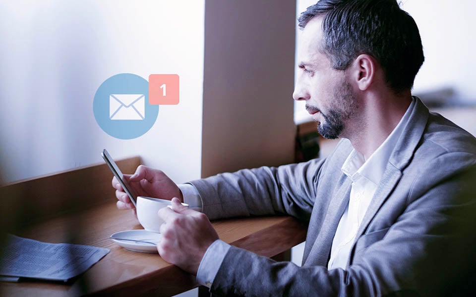 Restaurant owner receiving real-time notifications and alerts on a mobile device for operational updates