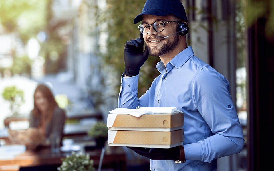 Takeaway order handover at restaurant pickup counter