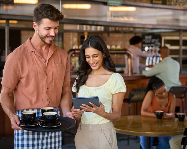 female-manager-with-digital-tablet-and-waiter-work-2023-11-27-05-16-53-utc